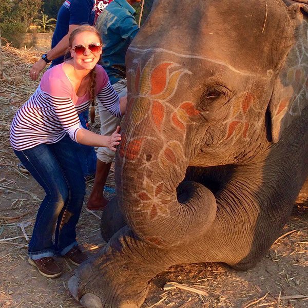 Nicole Evans with an elephant